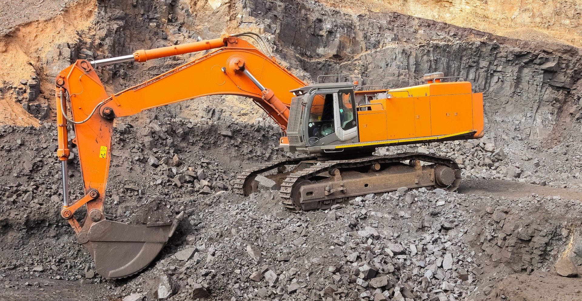 Excavator at open-pit copper mine